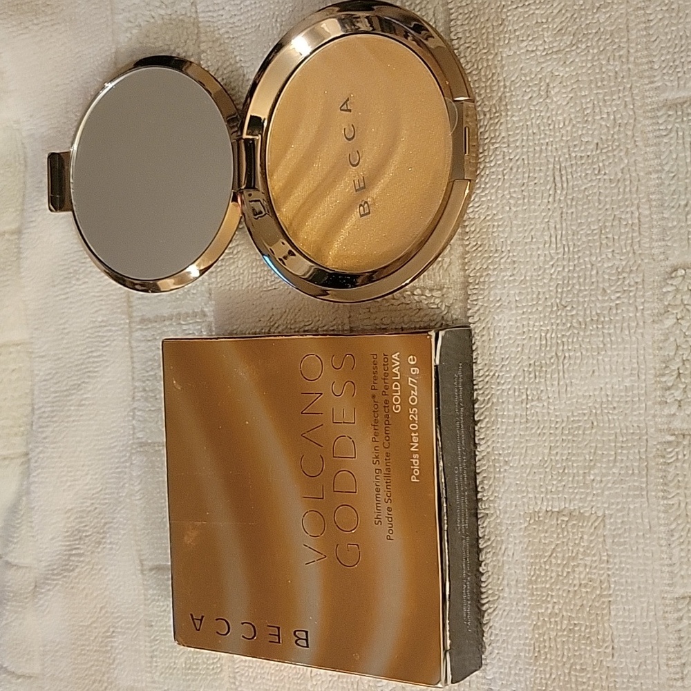Becca volcano goddess shimmer skin perfector in Gold Lava